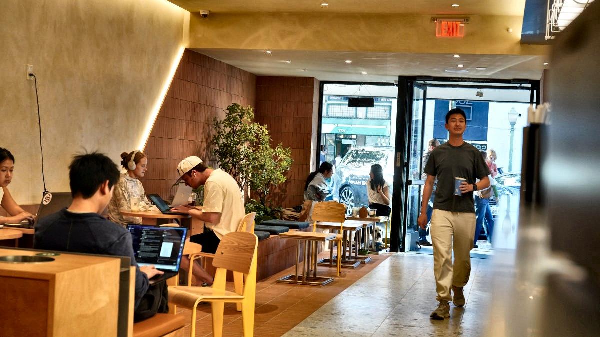Customers working and ordering inside the Palo Alto store